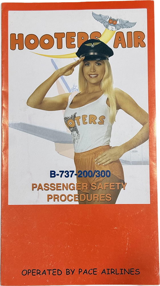Archival Hooters Air safety card cover